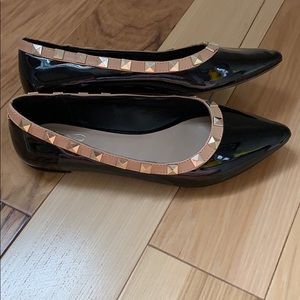 Black and gold flats